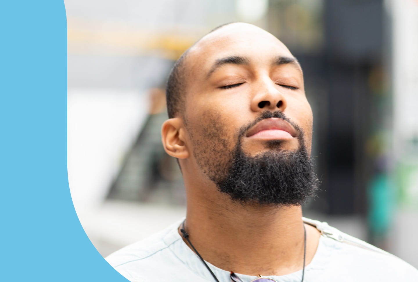 COVID-19: Taking Care of Your Mental Health Young man with his eyes closed.