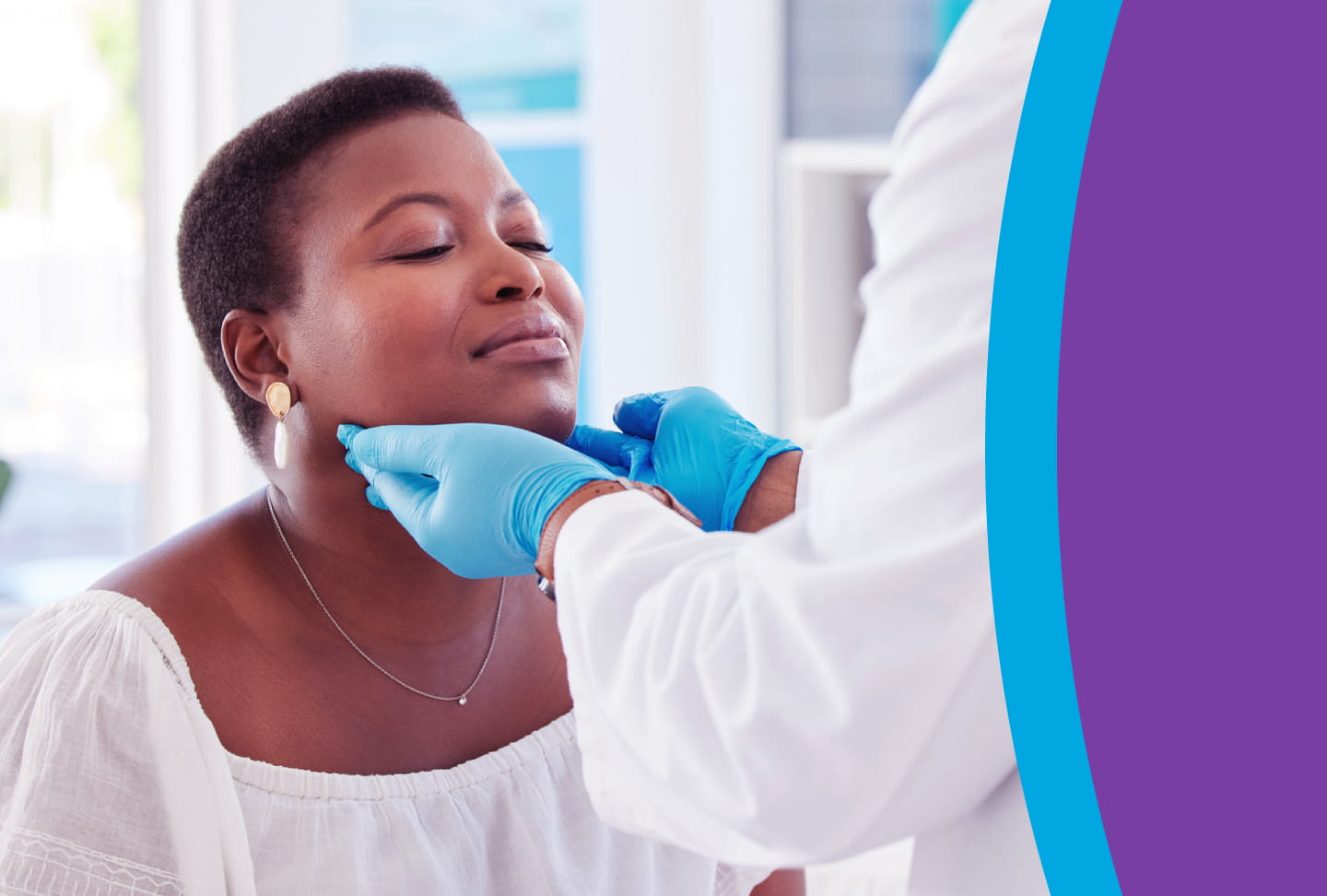 Expert Treatment for Head and Neck Cancers at Wellstar Gloved physician checks a patient's head, neck and jaw