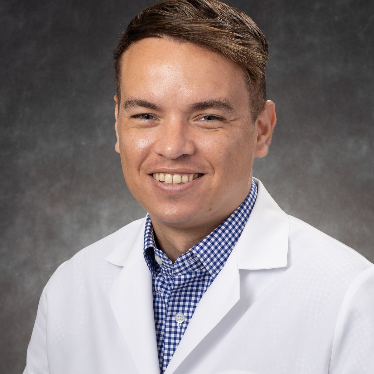 A friendly headshot of Hector Flores-Bermudez, MD