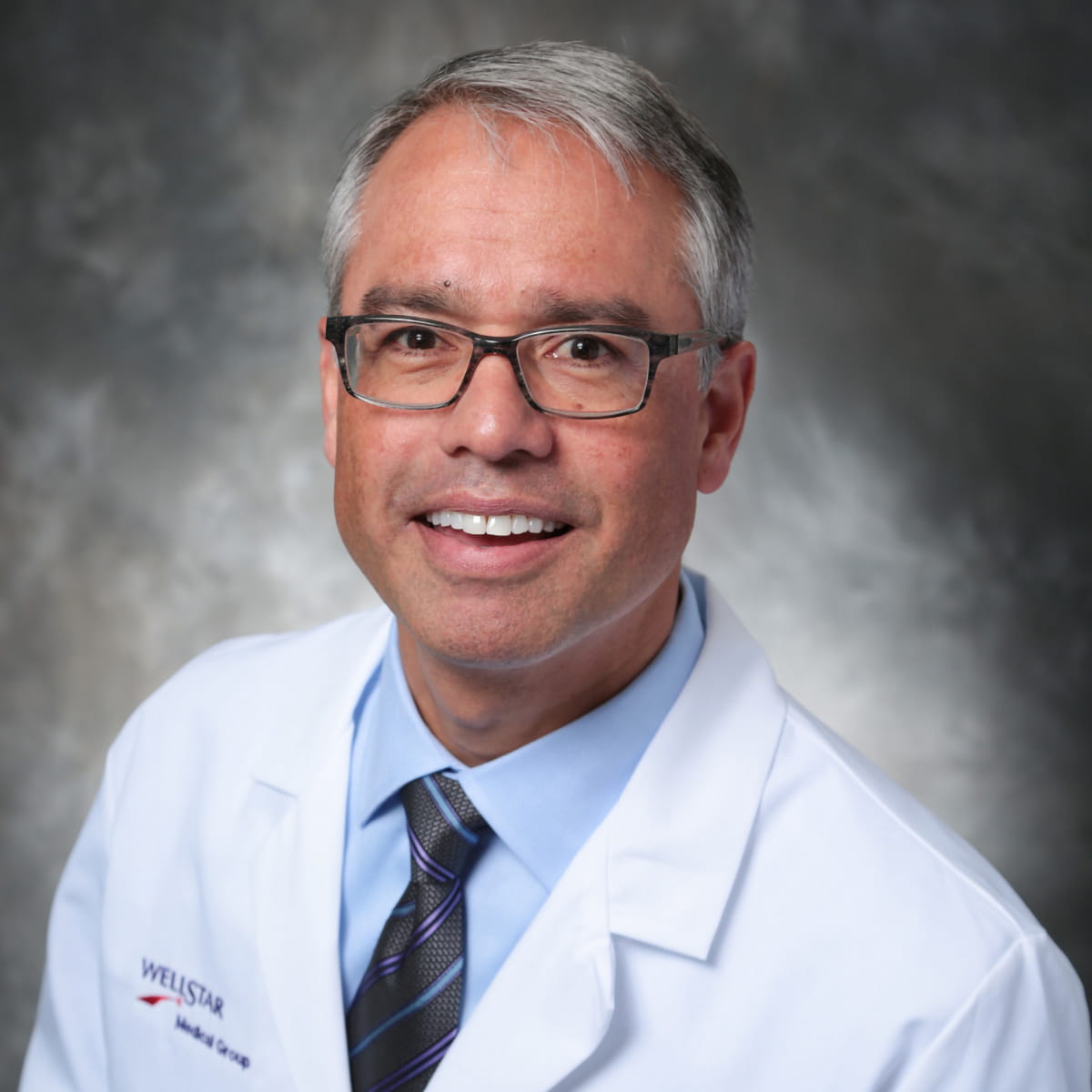 A friendly headshot of Peter Jungblut, MD