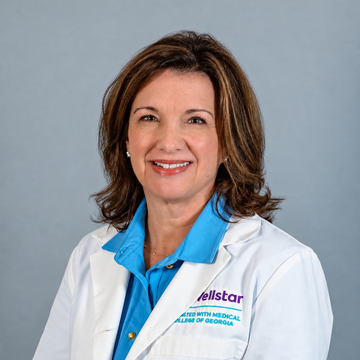Friendly headshot of Dr. Christy April Fox