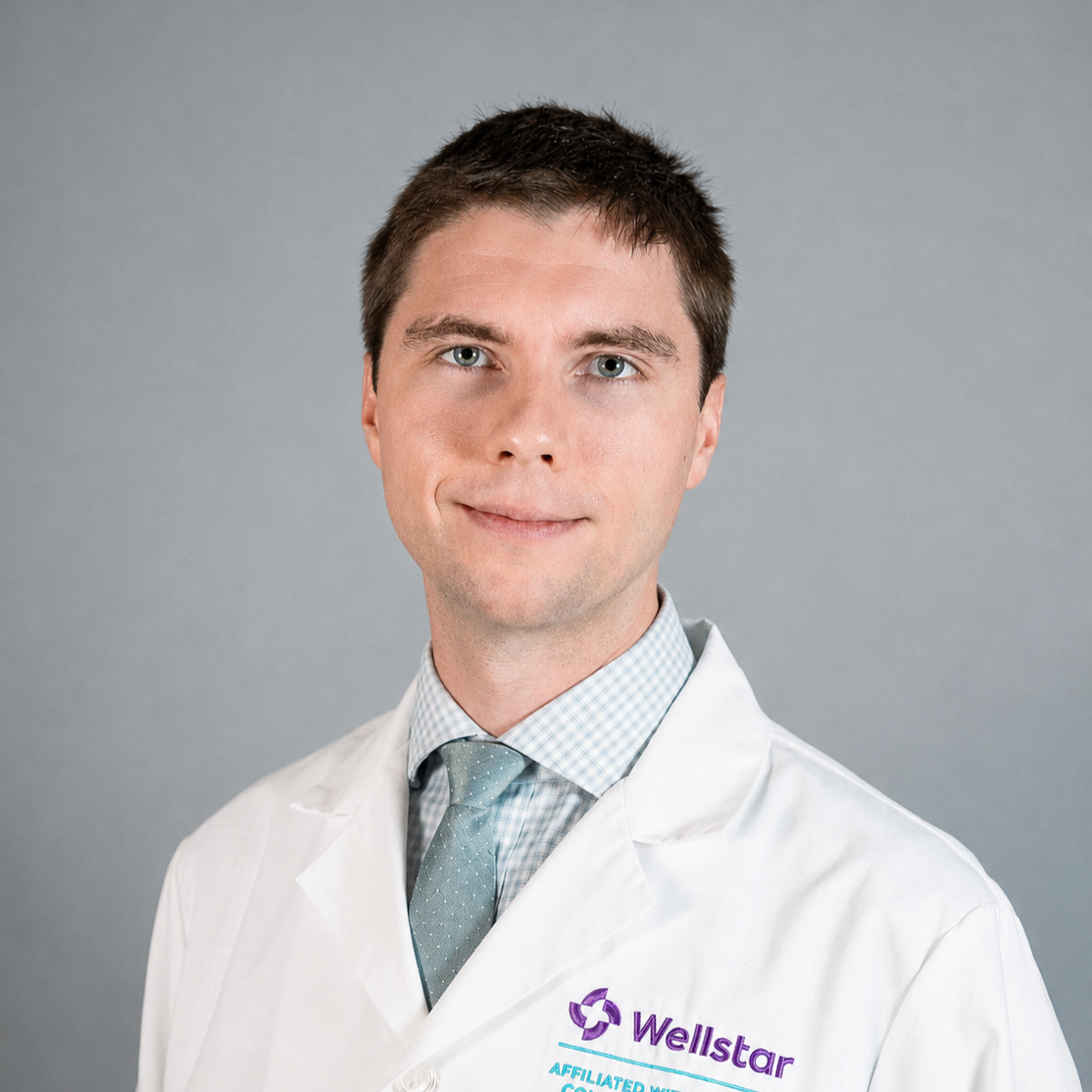Friendly headshot of Dr. John Ryan Curcuru