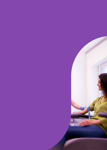 Image of nurse drawing blood from patient