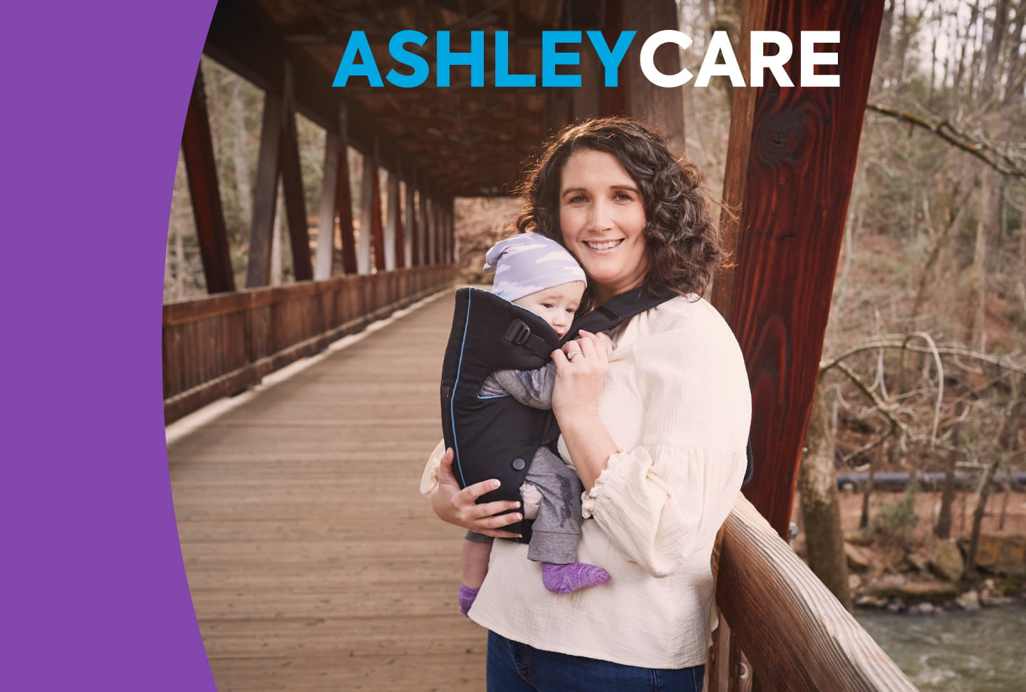 Ashley with her baby on a bridge