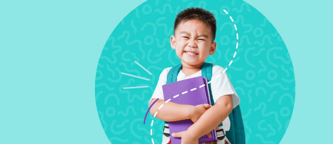 Smiling child with backpack and notebooks