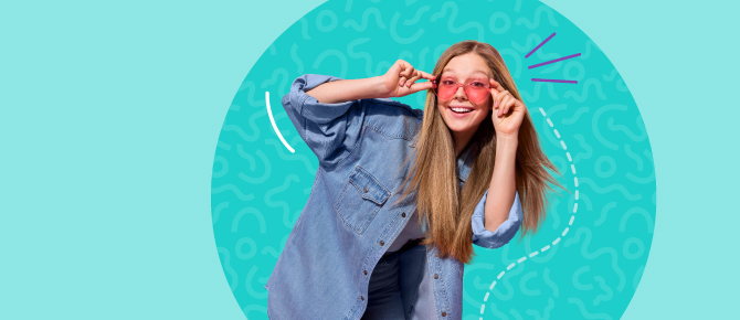 Smiling teen shows off her sunglasses