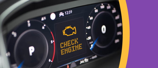 Car dashboard with check engine light on