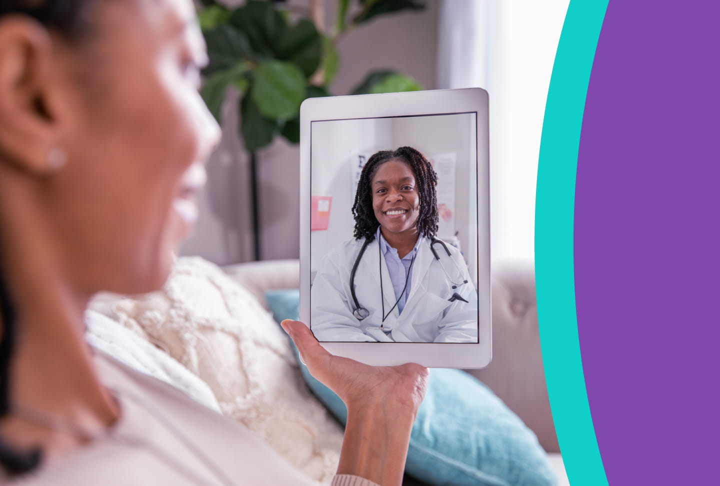Person speaking with doctor during virtual visit on tablet