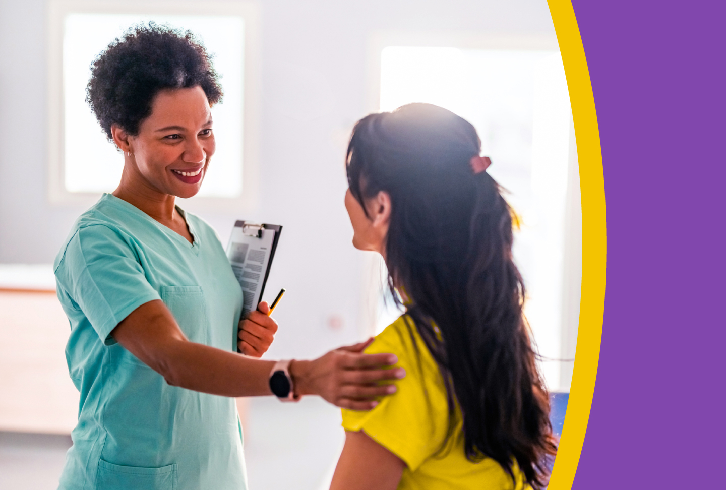 Clinician speaking with patient