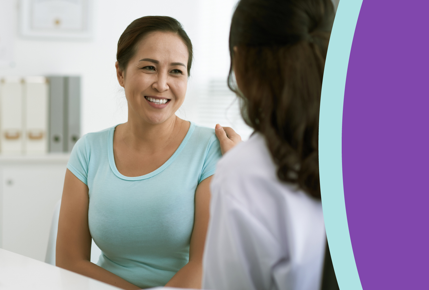 4 Common Questions About Gynecologic Cancer—Answered A woman's healthcare provider consults with her, placing a comforting hand on her shoulder