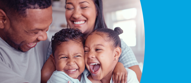 Family members embrace and smile