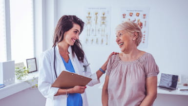 Healthcare provider has a friendly conversation with her patient