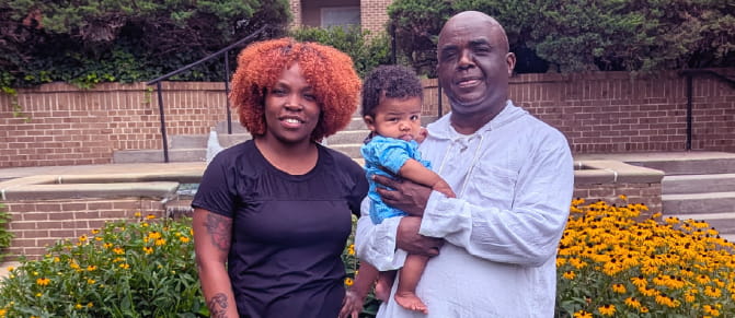 Robert Frederick, a new grandfather, poses proudly with his daughter and her infant son. With Wellstar helping him manage his HCM, he can keep making memories with his growing family. 