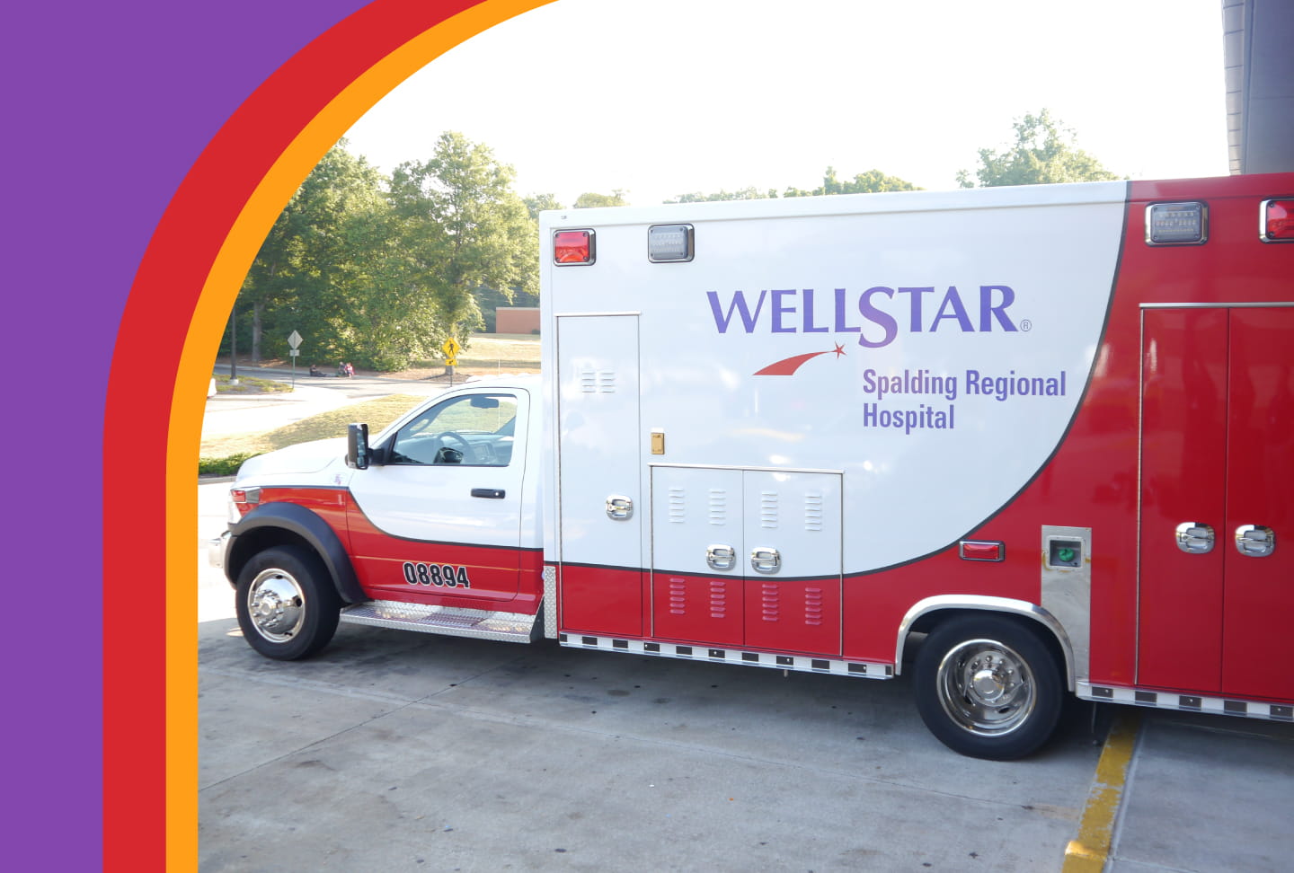 EMS truck with the Wellstar Spalding Regional Hospital logo.