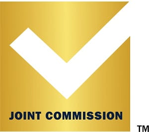 Image of check mark and reads Joint Commission(TM).