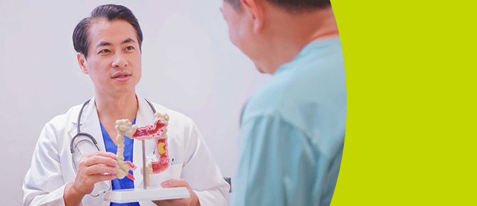 Like the man in this image, it's normal to be too shocked to ask questions when diagnosed with colorectal cancer. Get answers from experts here.