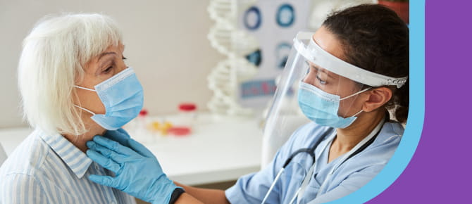 Provider checking patient's neck