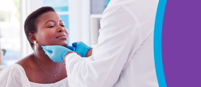 Gloved physician checks a patient's head, neck and jaw