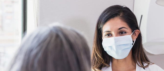 Patient talking with her Wellstar primary care physician