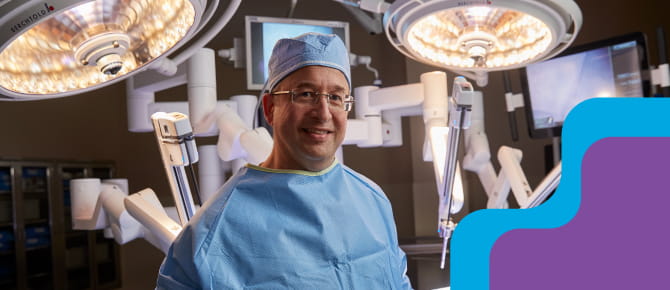 Wellstar urologist Scott Miller, MD standing in surgery room