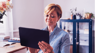 Woman looking at tablet
