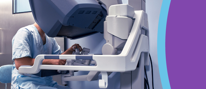 image features surgeon seated at the console of a robotic surgery system with his hands on the controls. additionally, there are sensors around his fingers. 