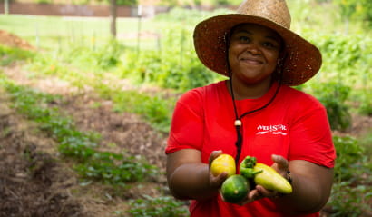 Wellstar team member working in a community garden