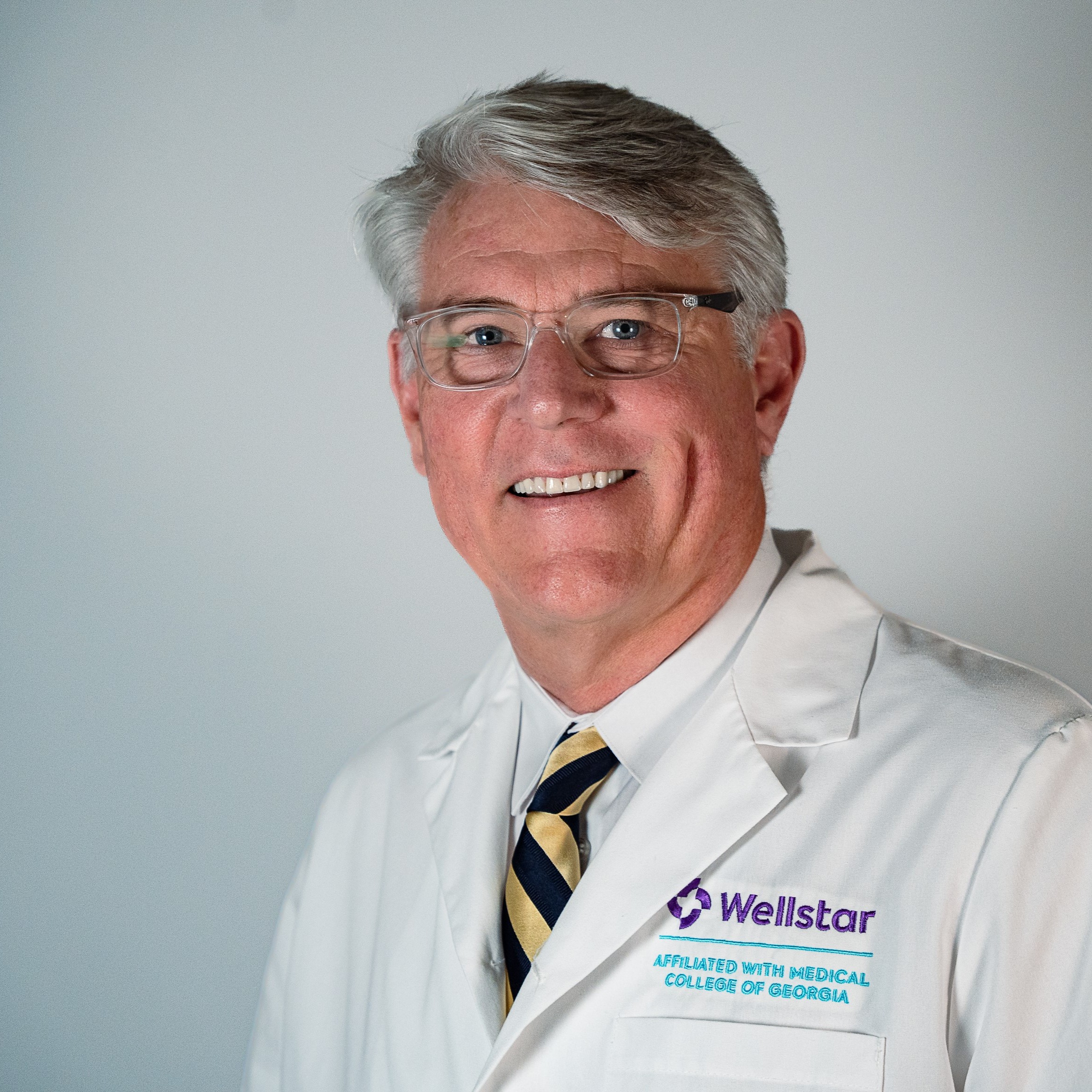 Friendly headshot of Dr. William Conkright