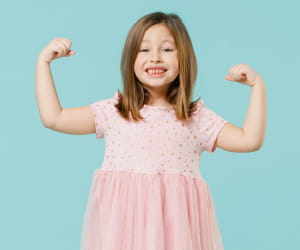 Image of little girl making strong arms