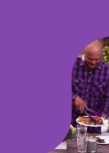 Man serves food to woman