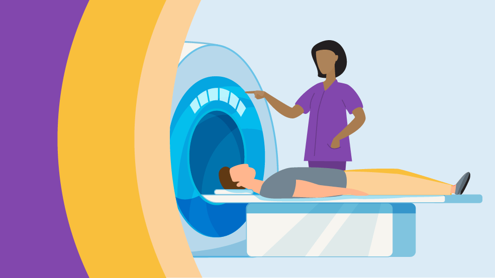 A provider adjusting the setting an MRI machine with a patient on the table