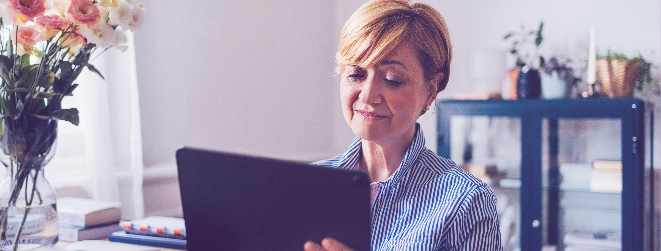 Image of woman and tablet