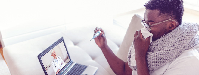 Image of sick person receiving virtual care