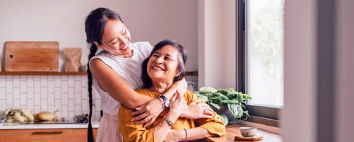 daughter hugging mother