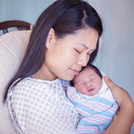 Image of mom holding baby