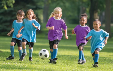 Children playing soccer