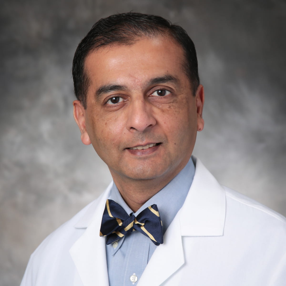 A friendly headshot of Absar Mirza, MD