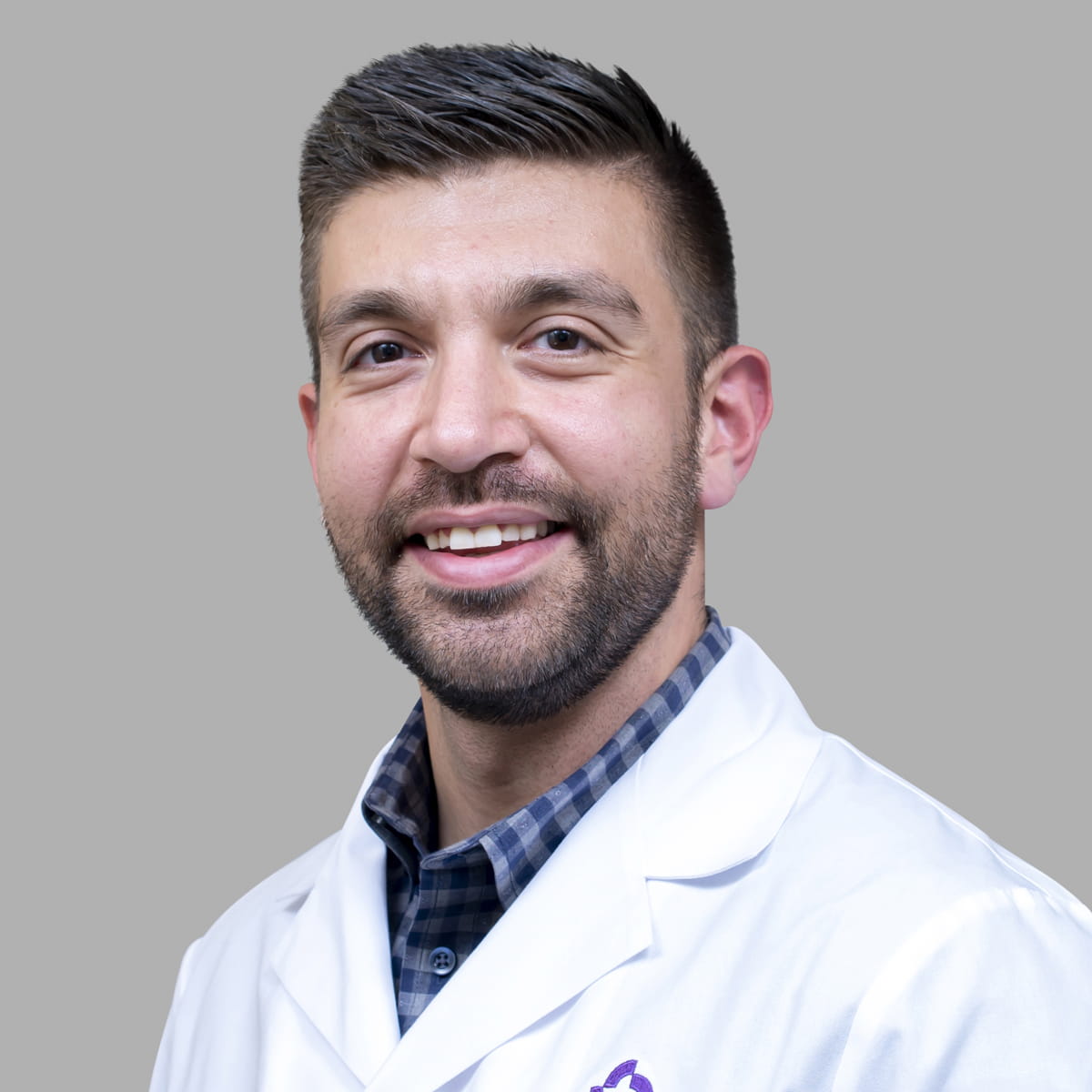 A friendly image of Adam Albano, MD
