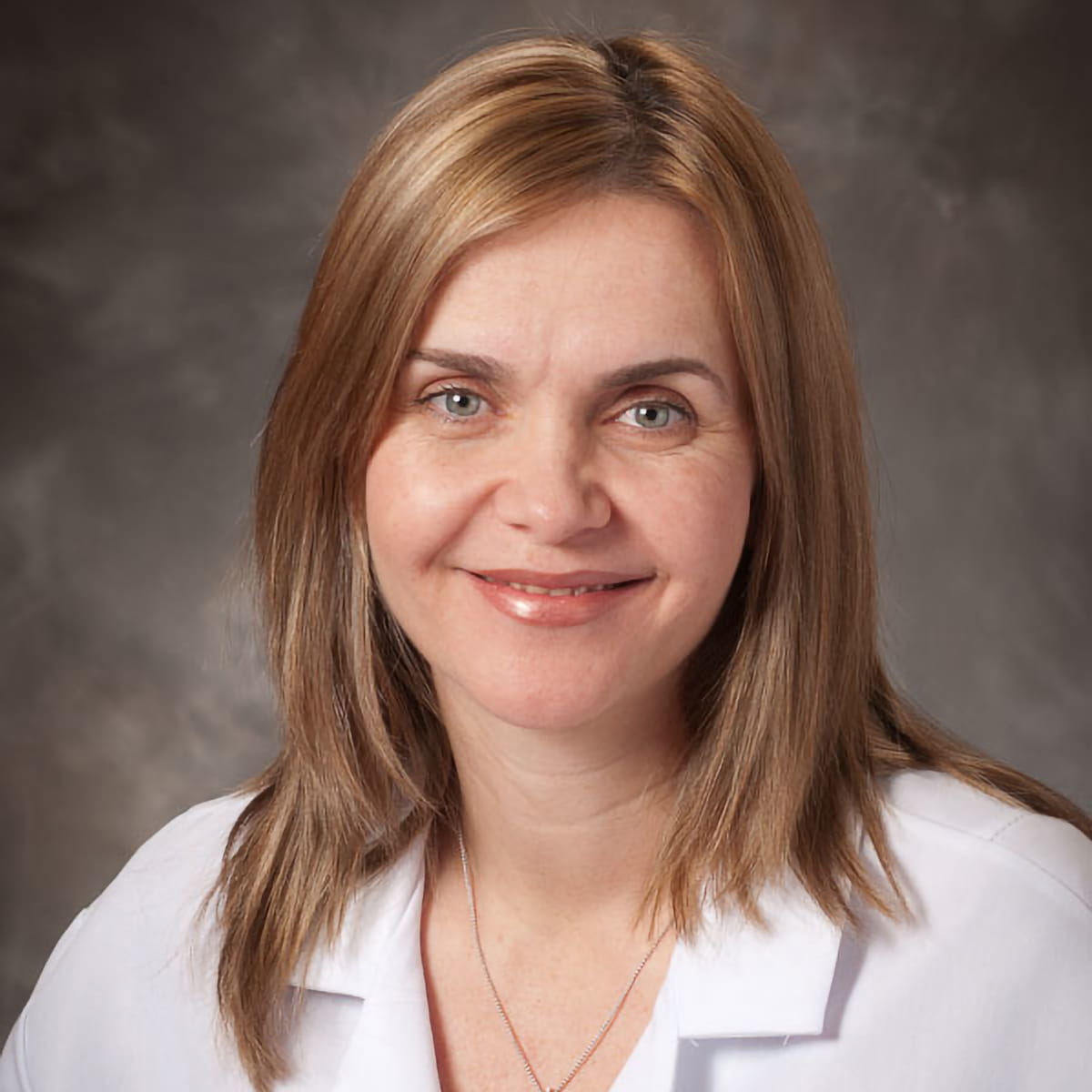 A friendly headshot of Ana Combes Osacar, MD