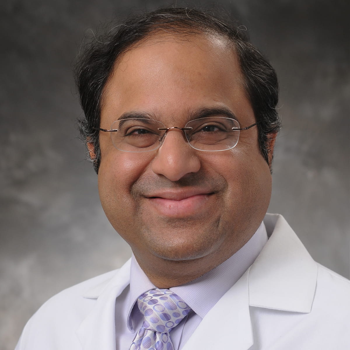 A friendly headshot of Anant Dalvi, MD