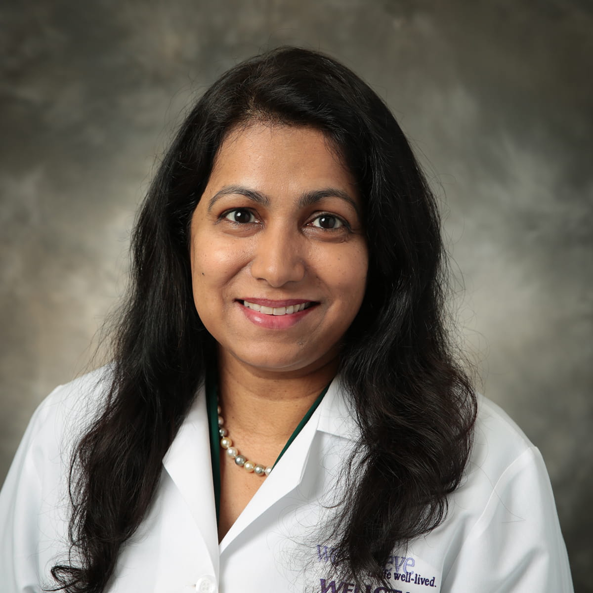 A friendly headshot of Archana Koganti, MD