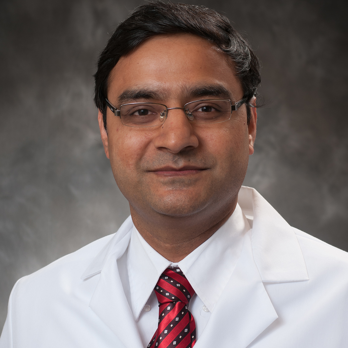 A friendly headshot of Aseem Shrivastava, MD