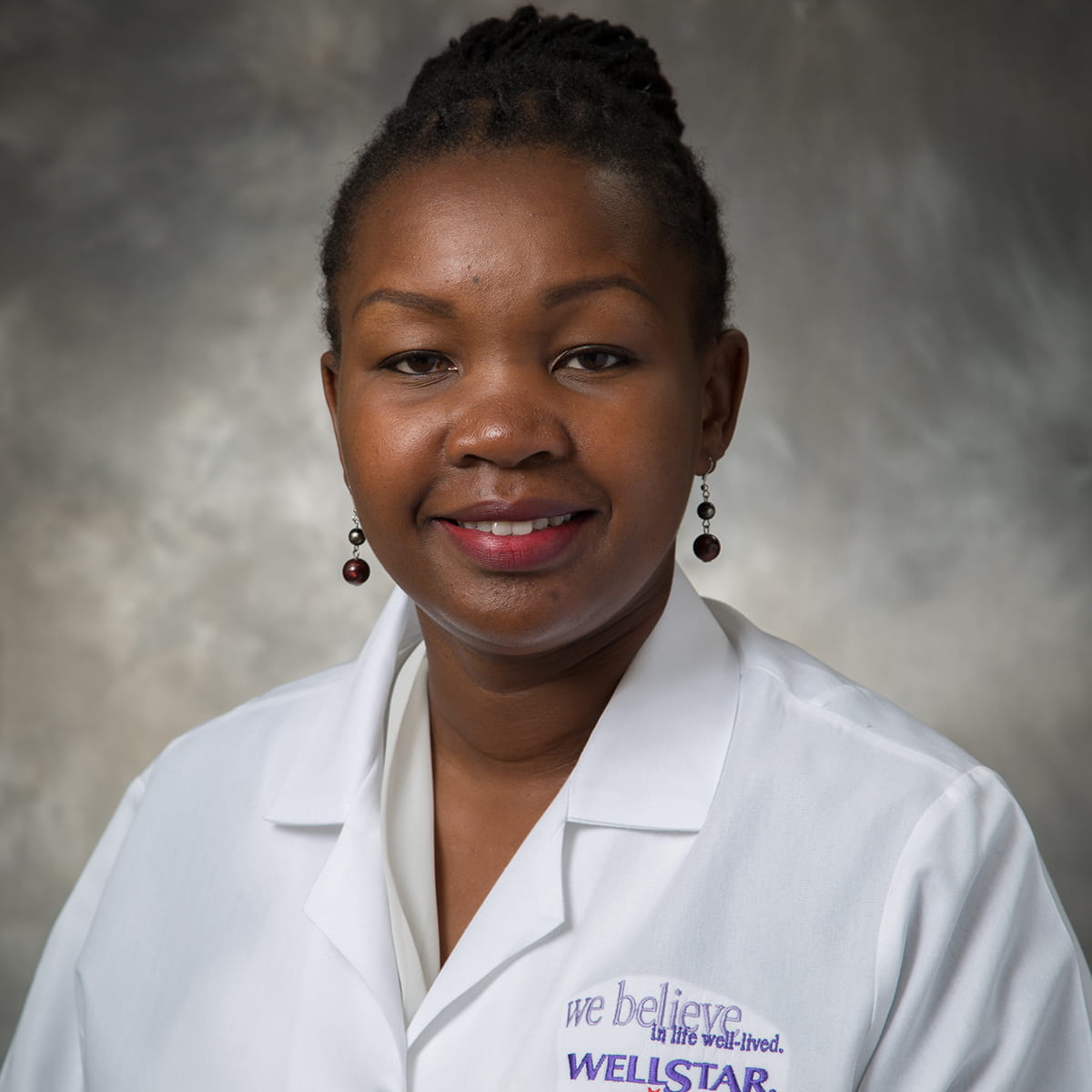 A friendly headshot of Dr. Benadette Makori-Nelson