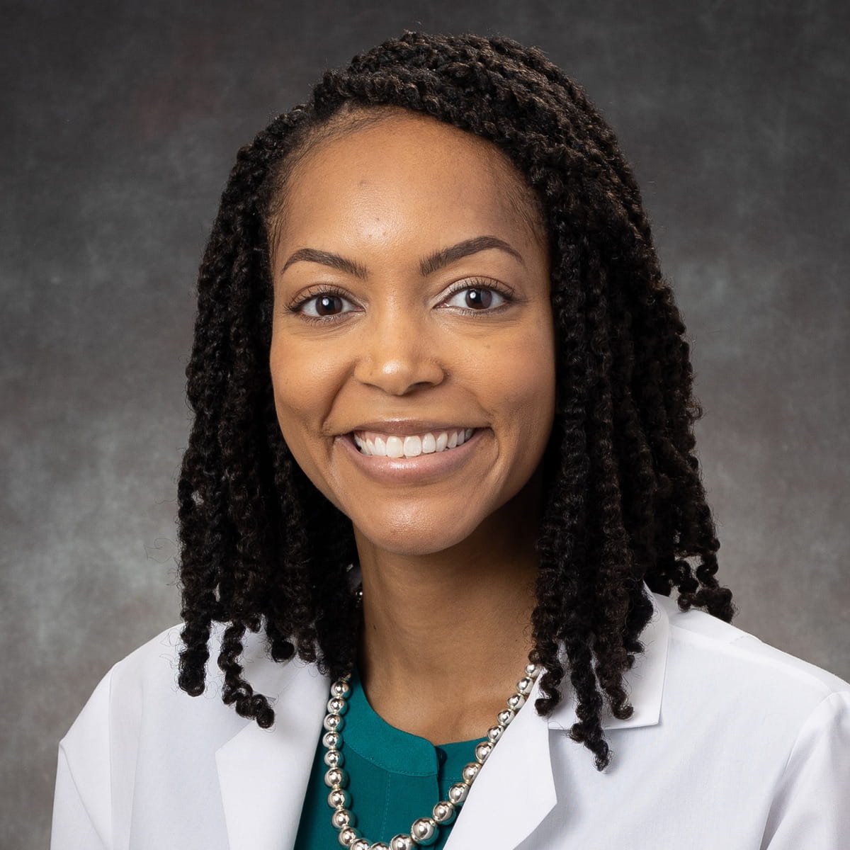 A friendly headshot of Brandi Lewis, MD