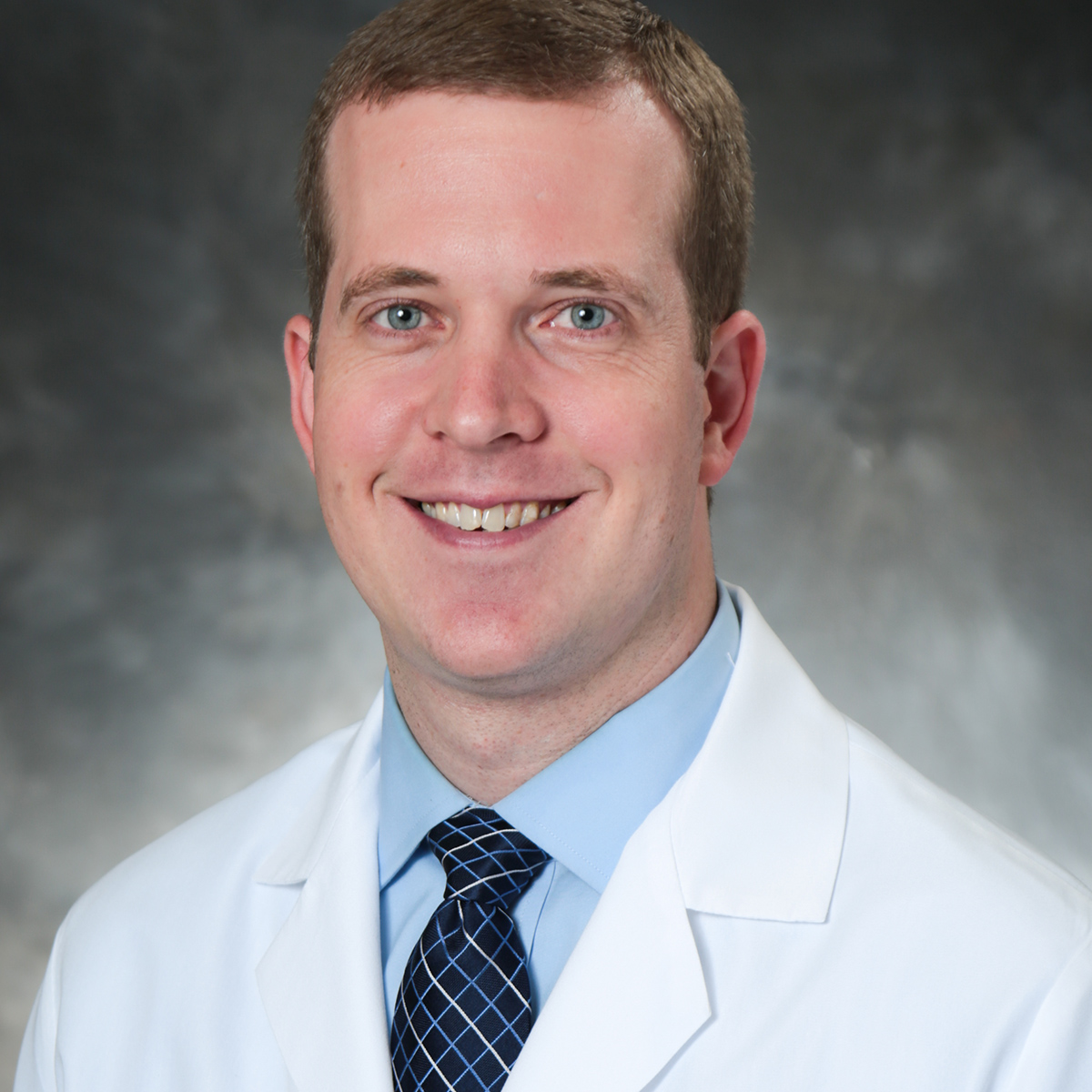 A friendly headshot of Brian Giles, MD