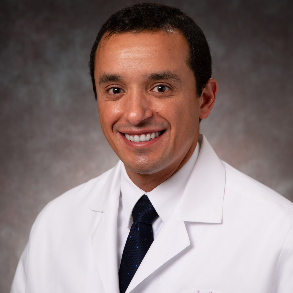 A friendly headshot of Carlos Franco Palacios, MD