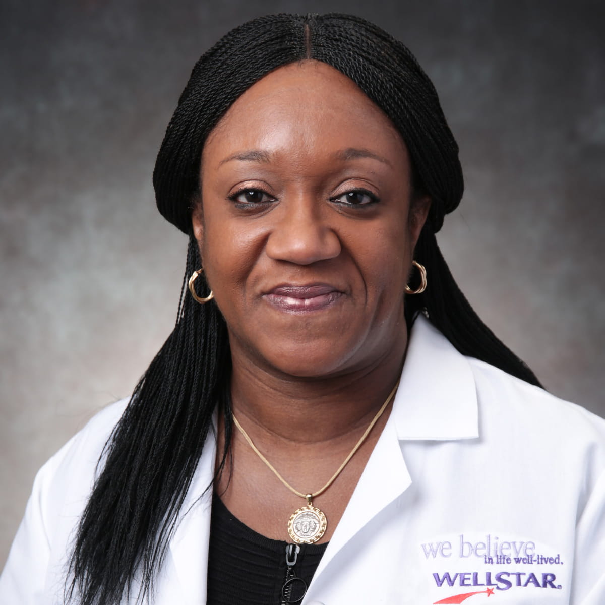 A friendly headshot of Catherine Onyiuke, MD