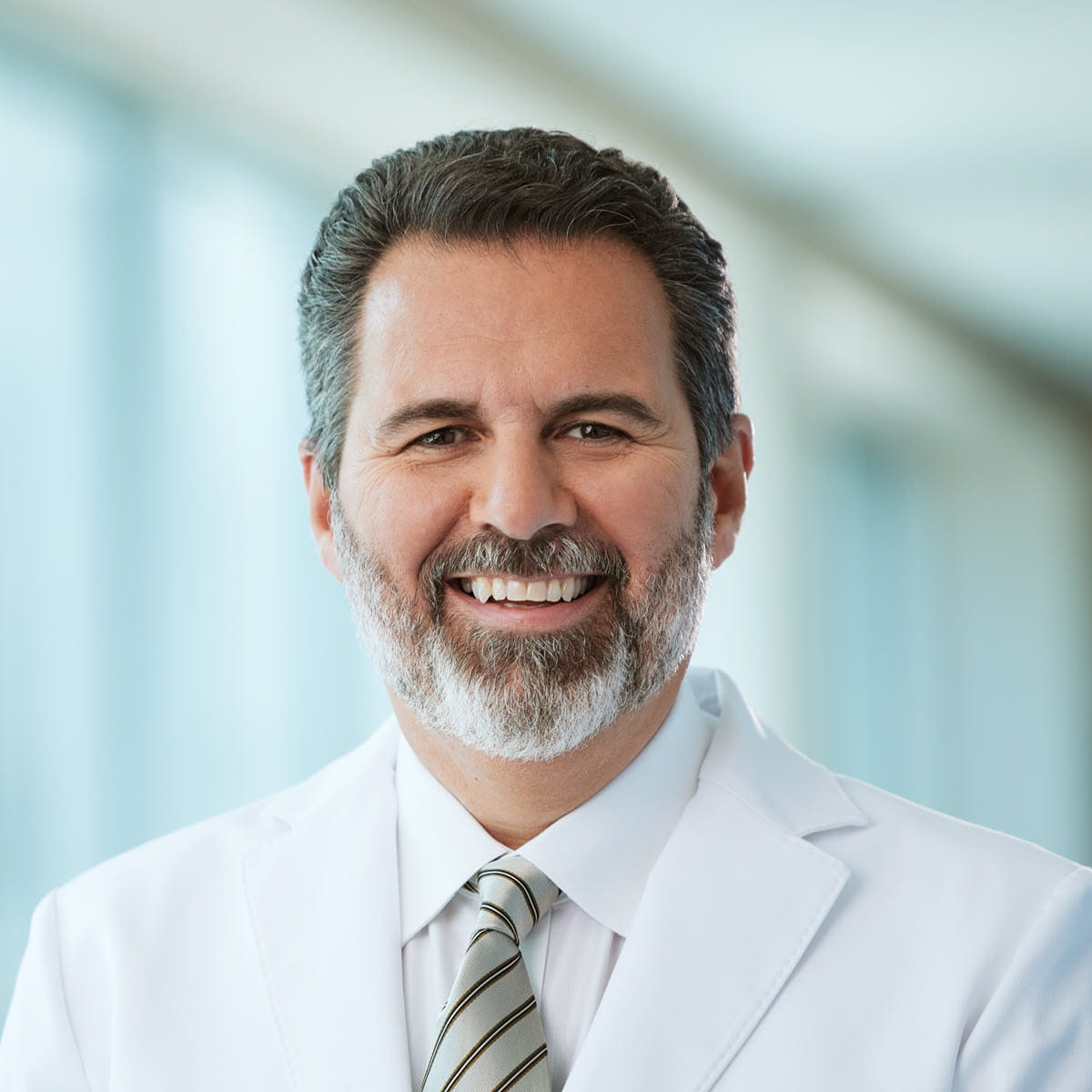 A friendly headshot of Christopher Tomaras, MD
