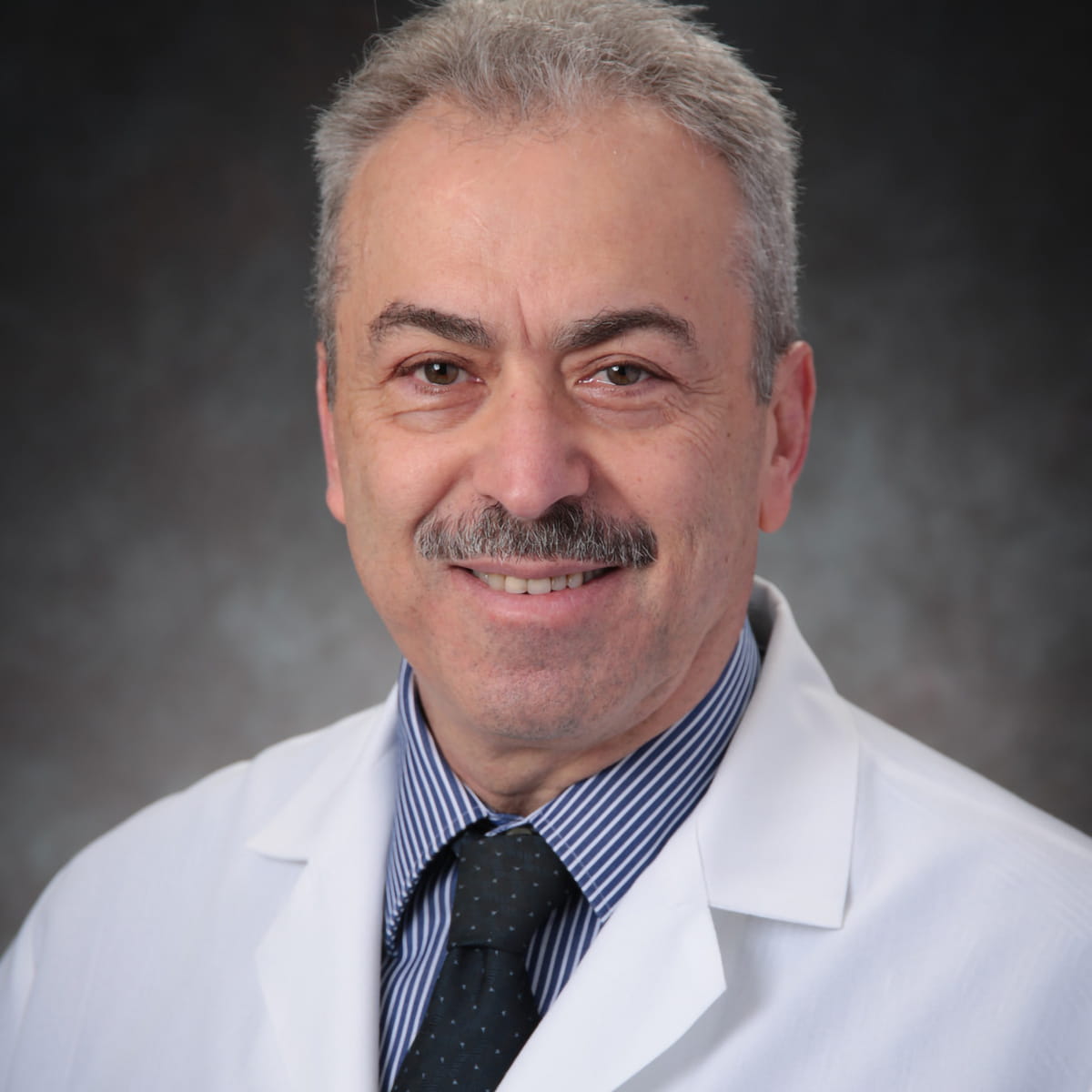 A friendly headshot of Daniel Assaf, MD