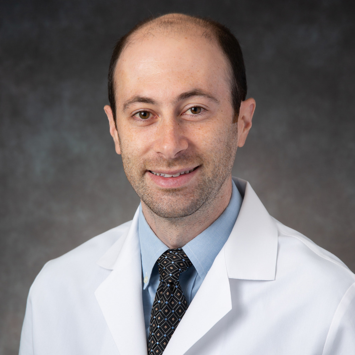 A friendly headshot of Daniel Mollengarden, MD